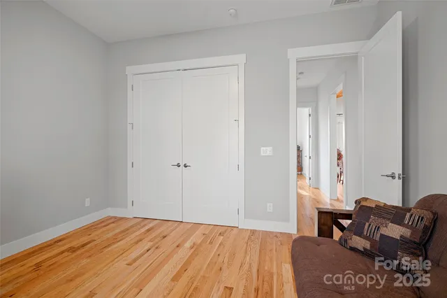 a bed room with a bed and a couch