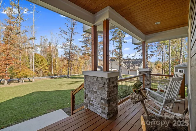 a view of swimming pool with outdoor seating