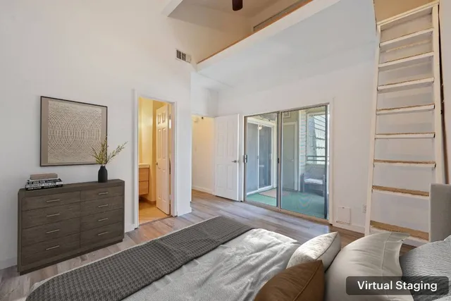 a bedroom with furniture and a bed