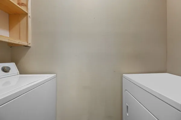 a bathroom with a shower and toilet