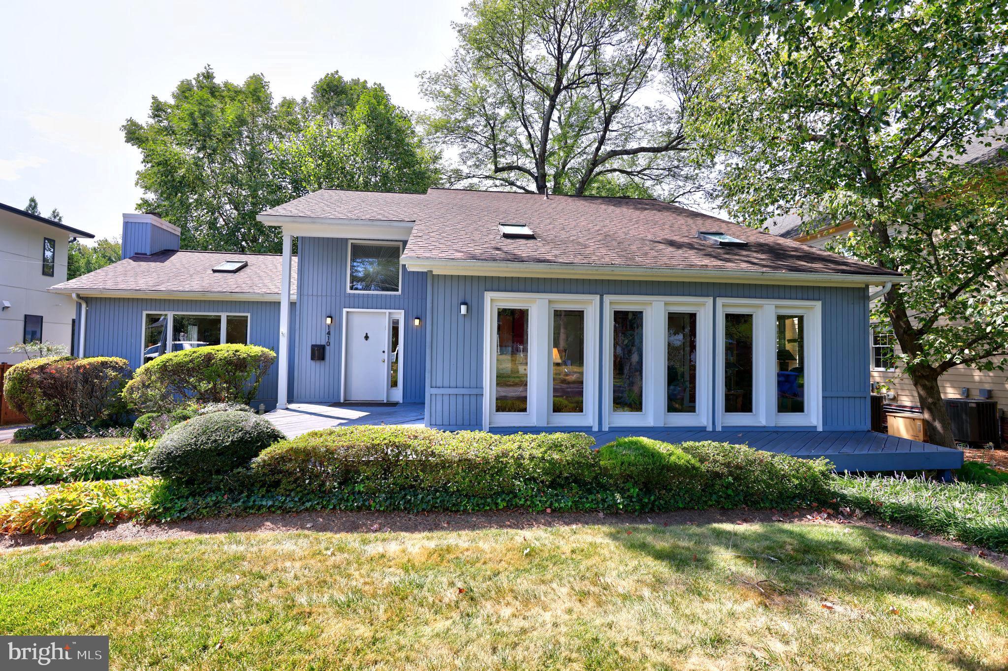 1410 Cedar Avenue McLean, VA 22101 - Photo 2 of 61 a view of a house with a garden and plants with large tree