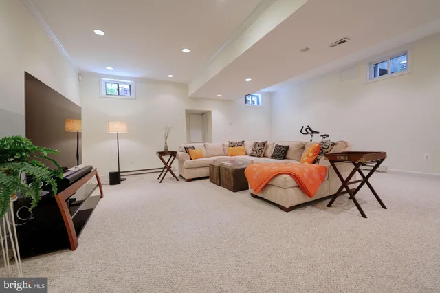 a living room with furniture and a couch