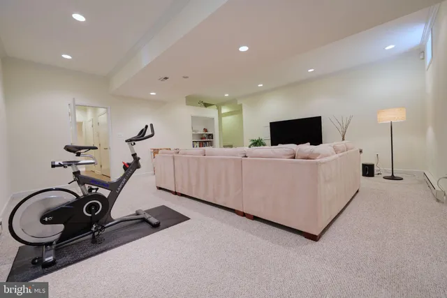 a room with furniture and a flat screen tv