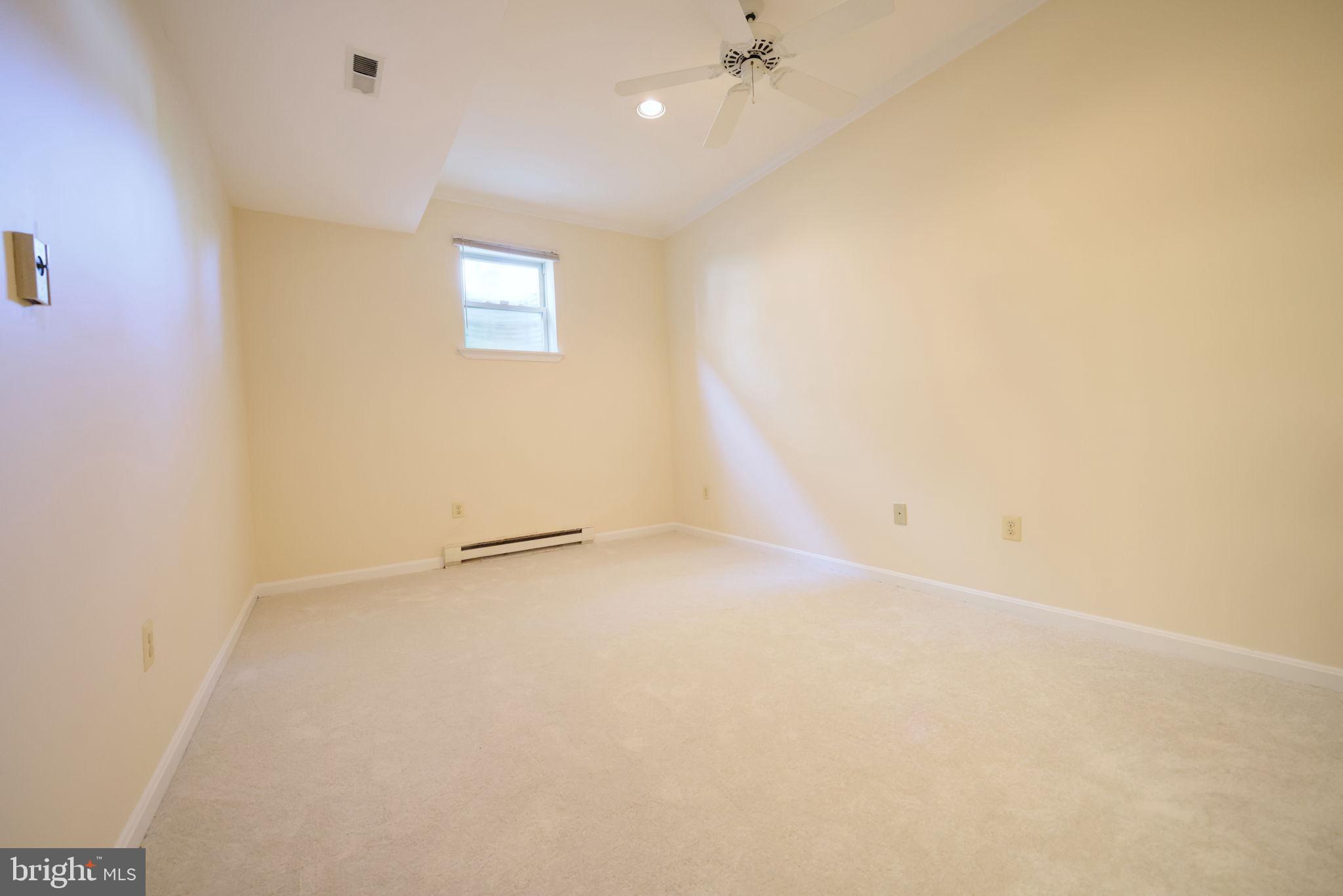 1410 Cedar Avenue McLean, VA 22101 - Photo 40 of 61 an empty room with a window