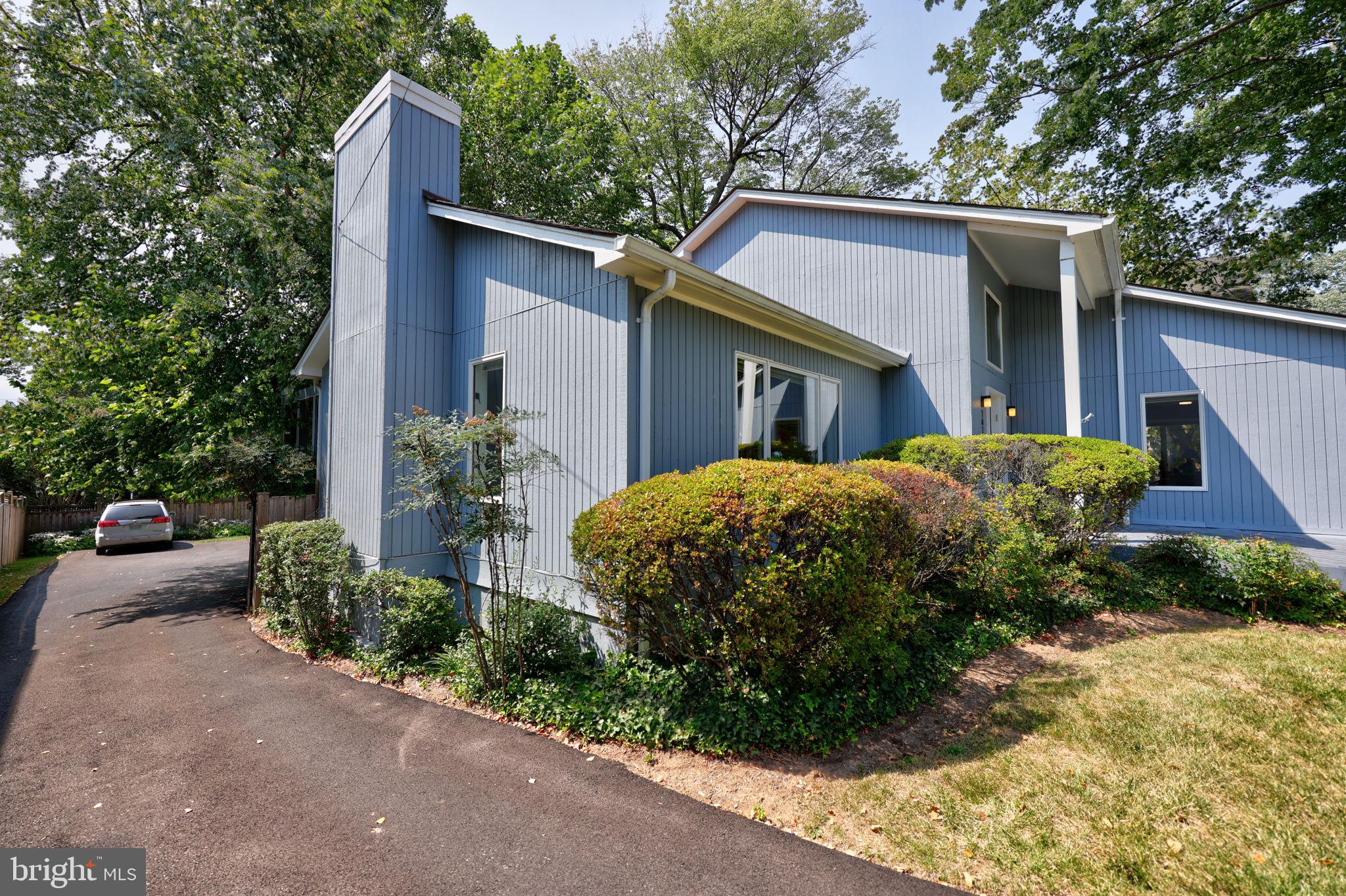 1410 Cedar Avenue McLean, VA 22101 - Photo 44 of 61 a view of a house with a yard plants and large tree