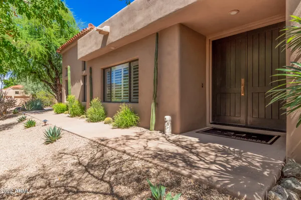 a view of a house with a patio