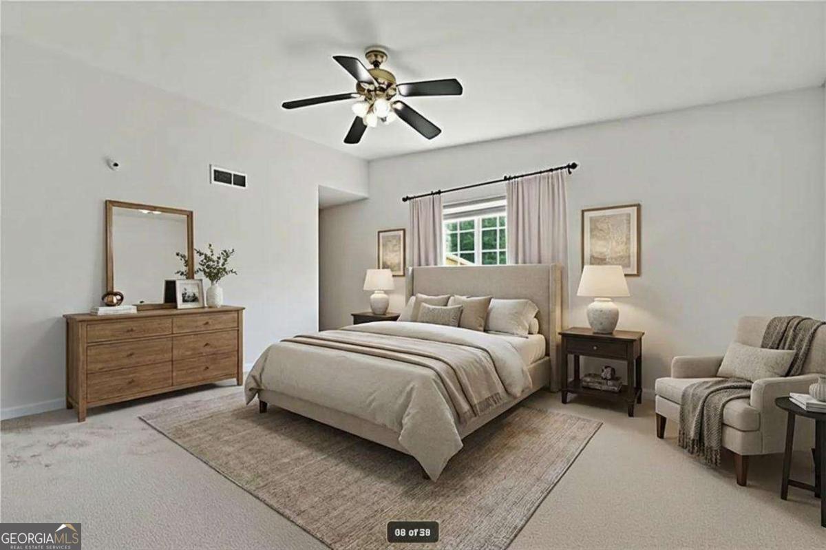1468 Briarwood Road Northeast, Unit 108 Atlanta, GA 30319 - Photo 5 of 5 a spacious bedroom with a bed and a chandelier
