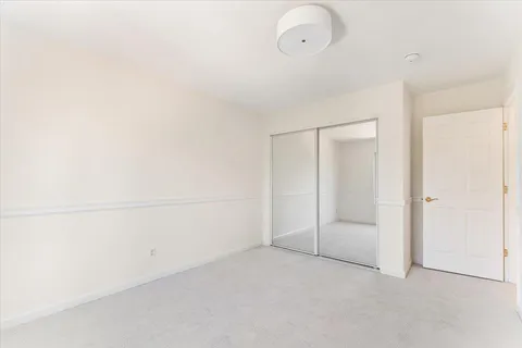 a view of a room with an empty space