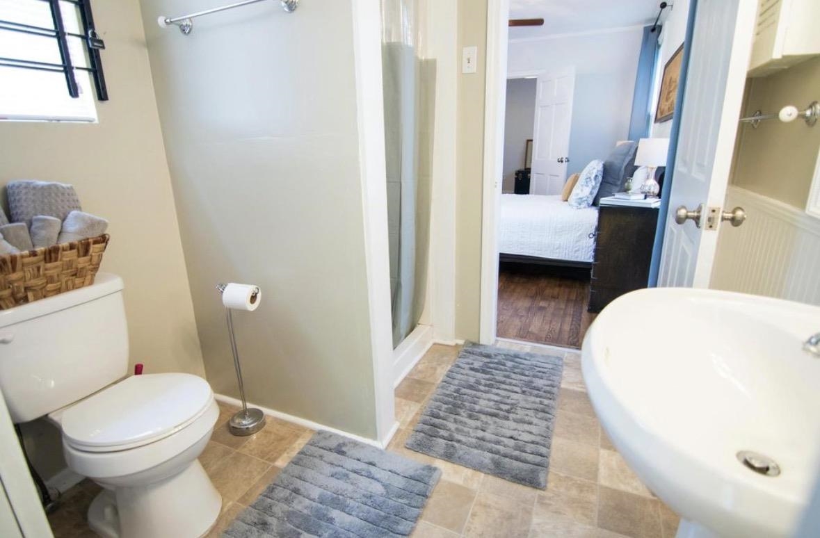 699 Shotwell Street Memphis, TN 38111 - Photo 21 of 33 Ensuite bathroom featuring a stall shower and toilet