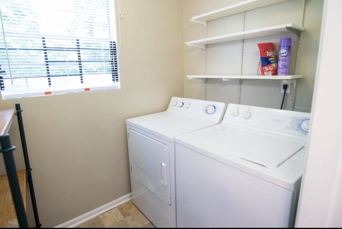 699 Shotwell Street Memphis, TN 38111 - Photo 22 of 33 Laundry room with independent washer and dryer and baseboards