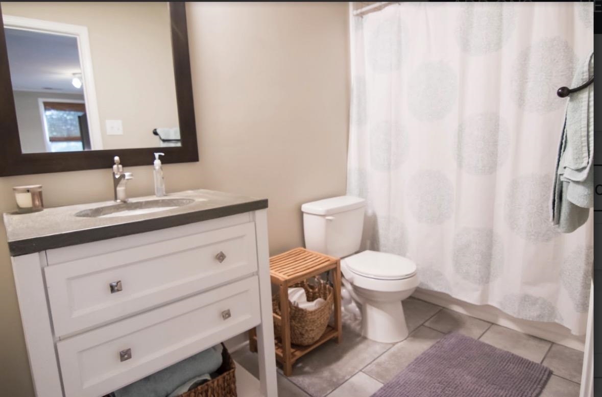 699 Shotwell Street Memphis, TN 38111 - Photo 28 of 33 Full bath featuring vanity and tile patterned flooring