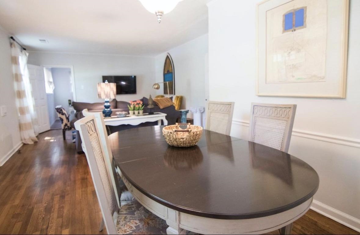 699 Shotwell Street Memphis, TN 38111 - Photo 32 of 33 Dining room featuring dark wood-style floors and baseboards