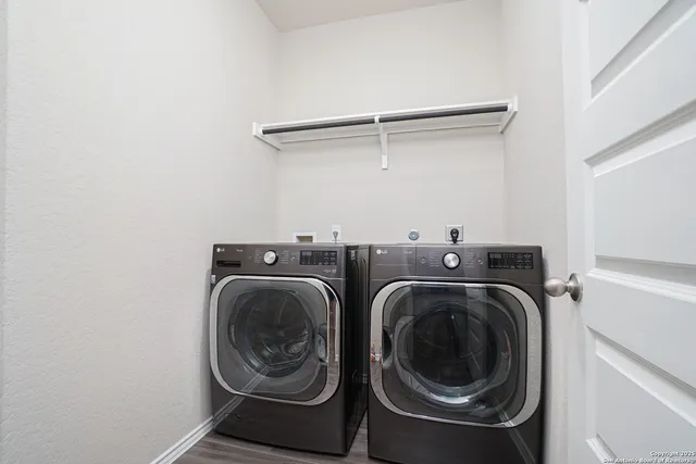 a utility room with dryer and washer