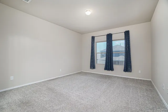 an empty room with window