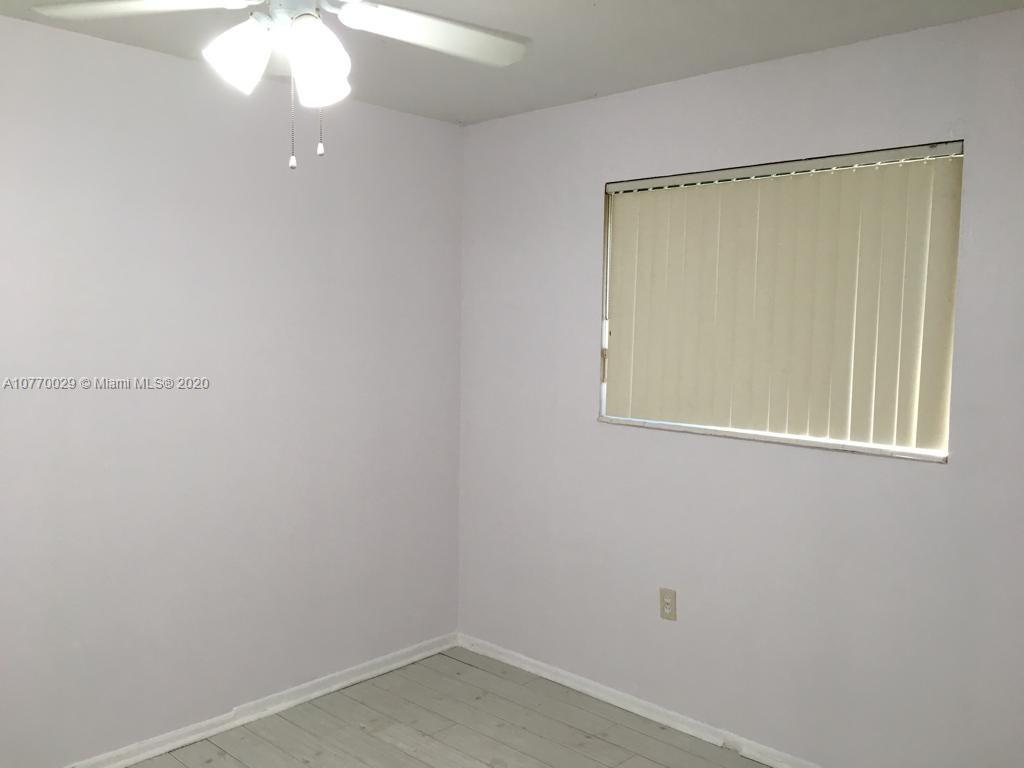 6301 Raleigh Street Hollywood, FL 33024 - Photo 11 of 19 a small space with a window