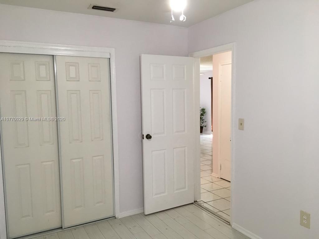 6301 Raleigh Street Hollywood, FL 33024 - Photo 9 of 19 a view of a bathroom with shower