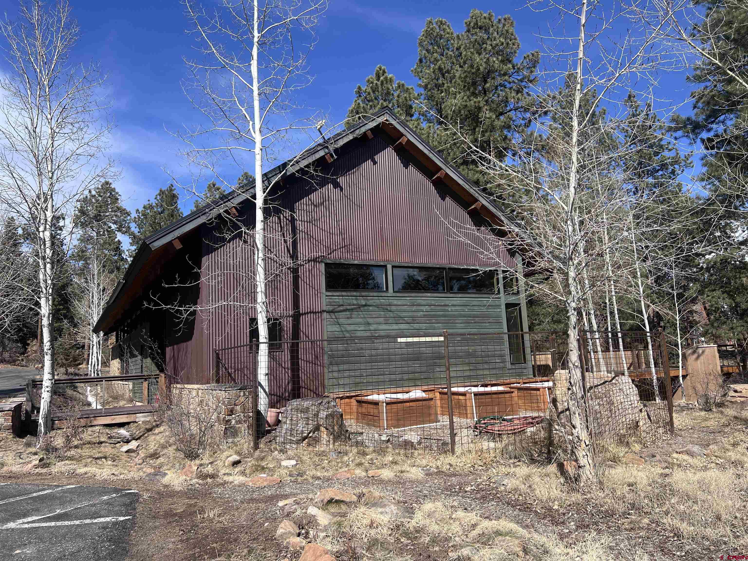 767 Red Canyon Trail Durango, CO 81301 - Photo 13 of 21 a front view of a house with a yard