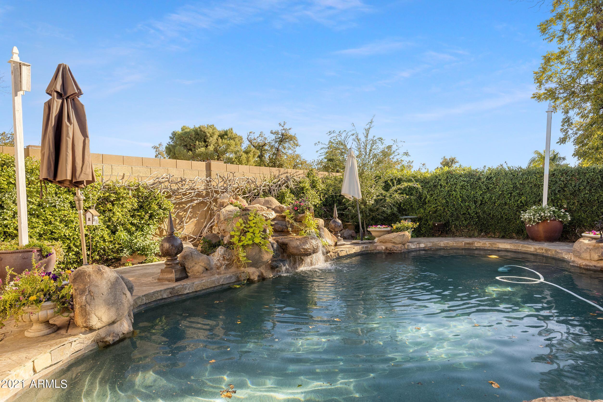 145 North Riata Street Gilbert, AZ 85234 - Photo 28 of 62 Pool & Waterfall