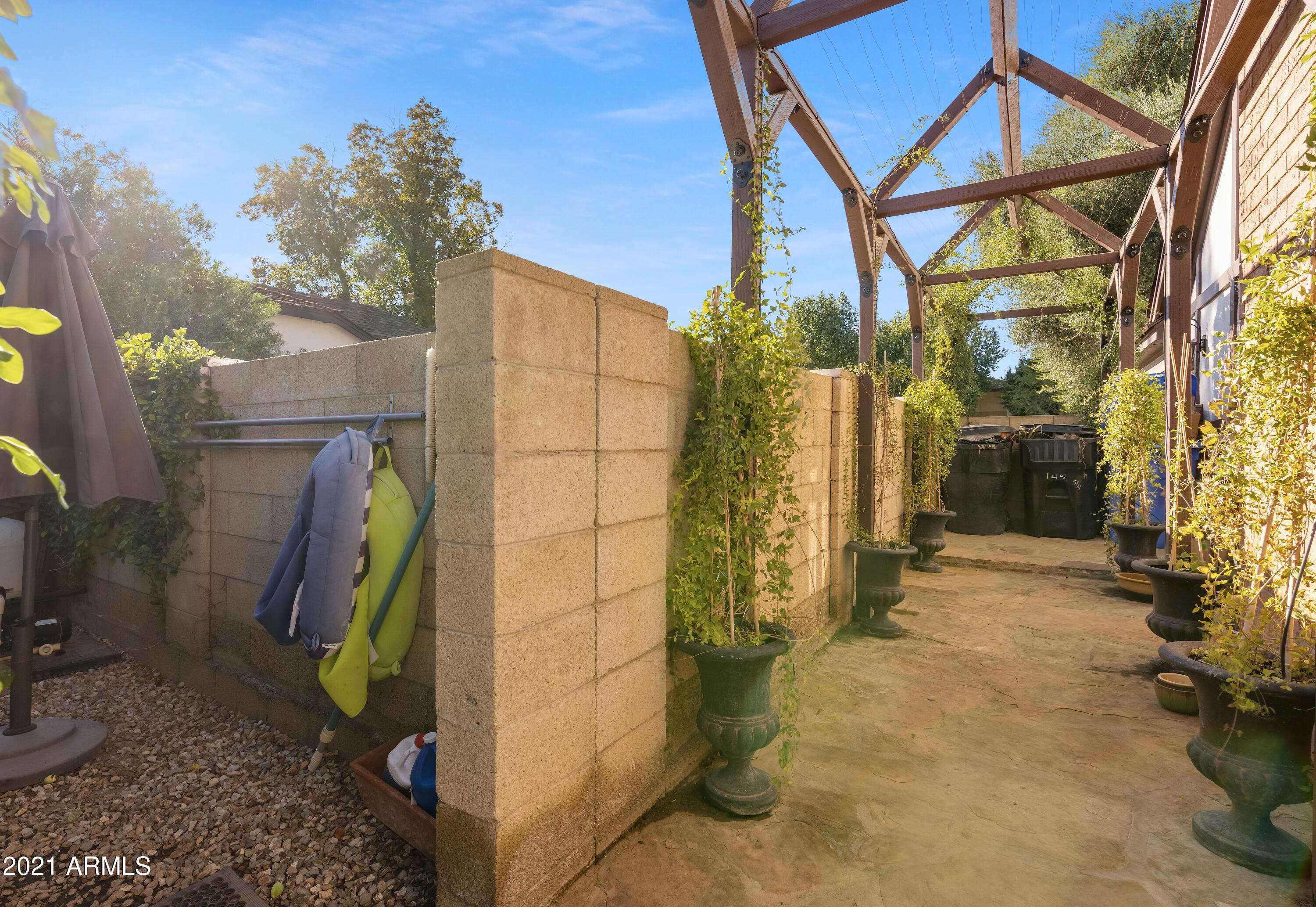 145 North Riata Street Gilbert, AZ 85234 - Photo 43 of 62 Covered Trellis to Frontyard