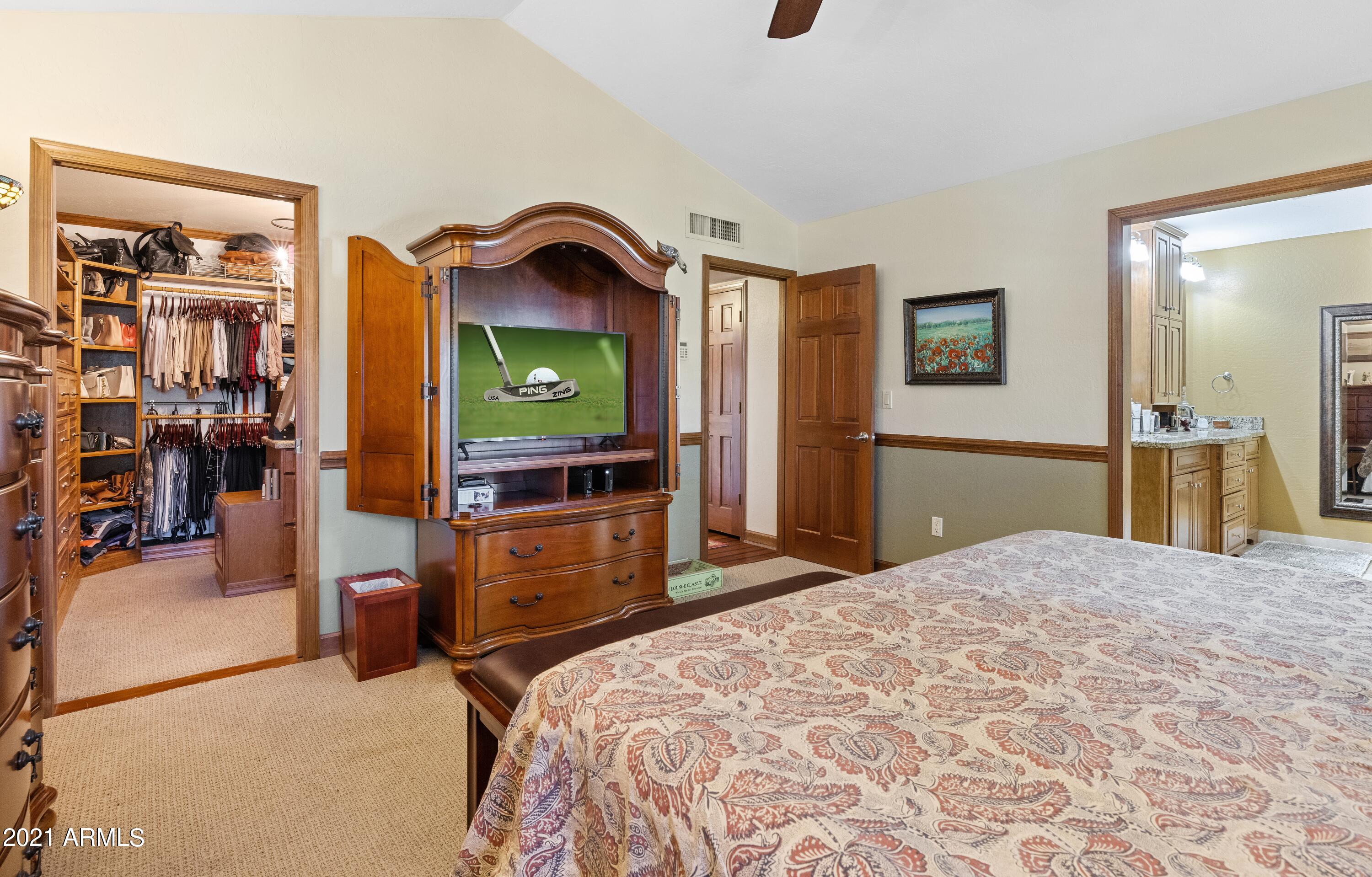 145 North Riata Street Gilbert, AZ 85234 - Photo 46 of 62 Master to First Walkin Closet