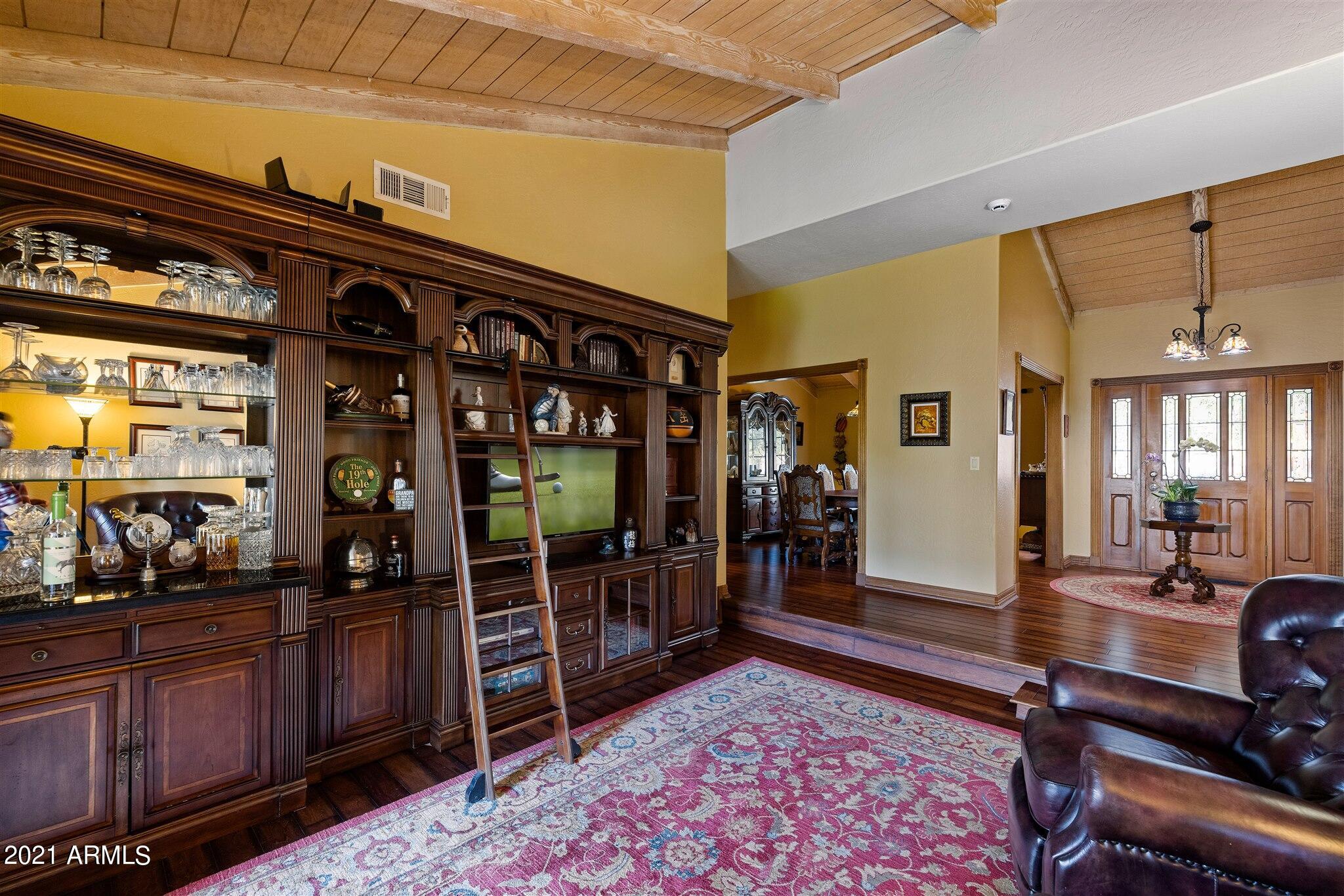 145 North Riata Street Gilbert, AZ 85234 - Photo 9 of 62 Living Room Bookcase