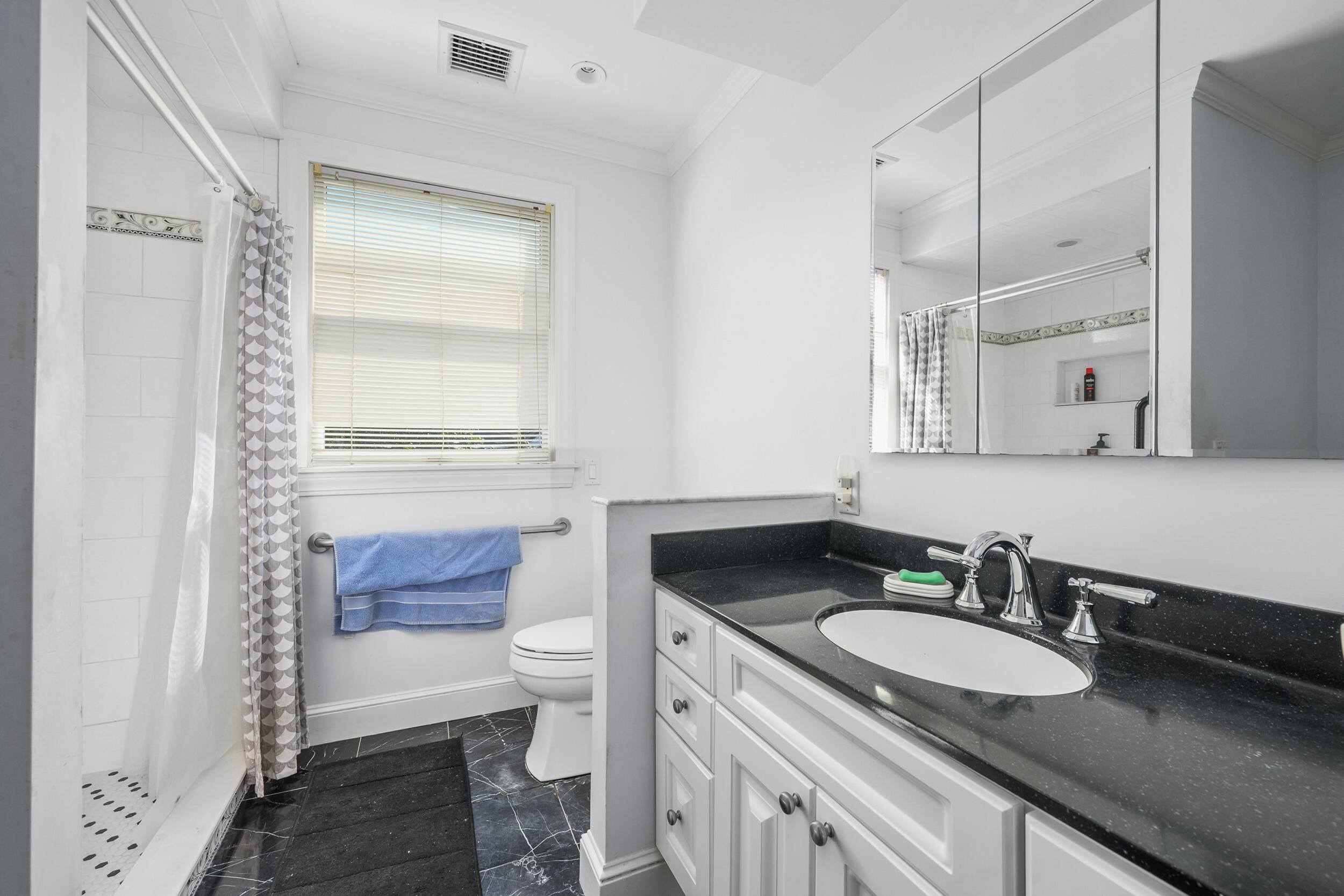 27 Mayflower Lane Dennis Port, MA 02639 - Photo 15 of 35 a bathroom with a granite countertop sink and a mirror