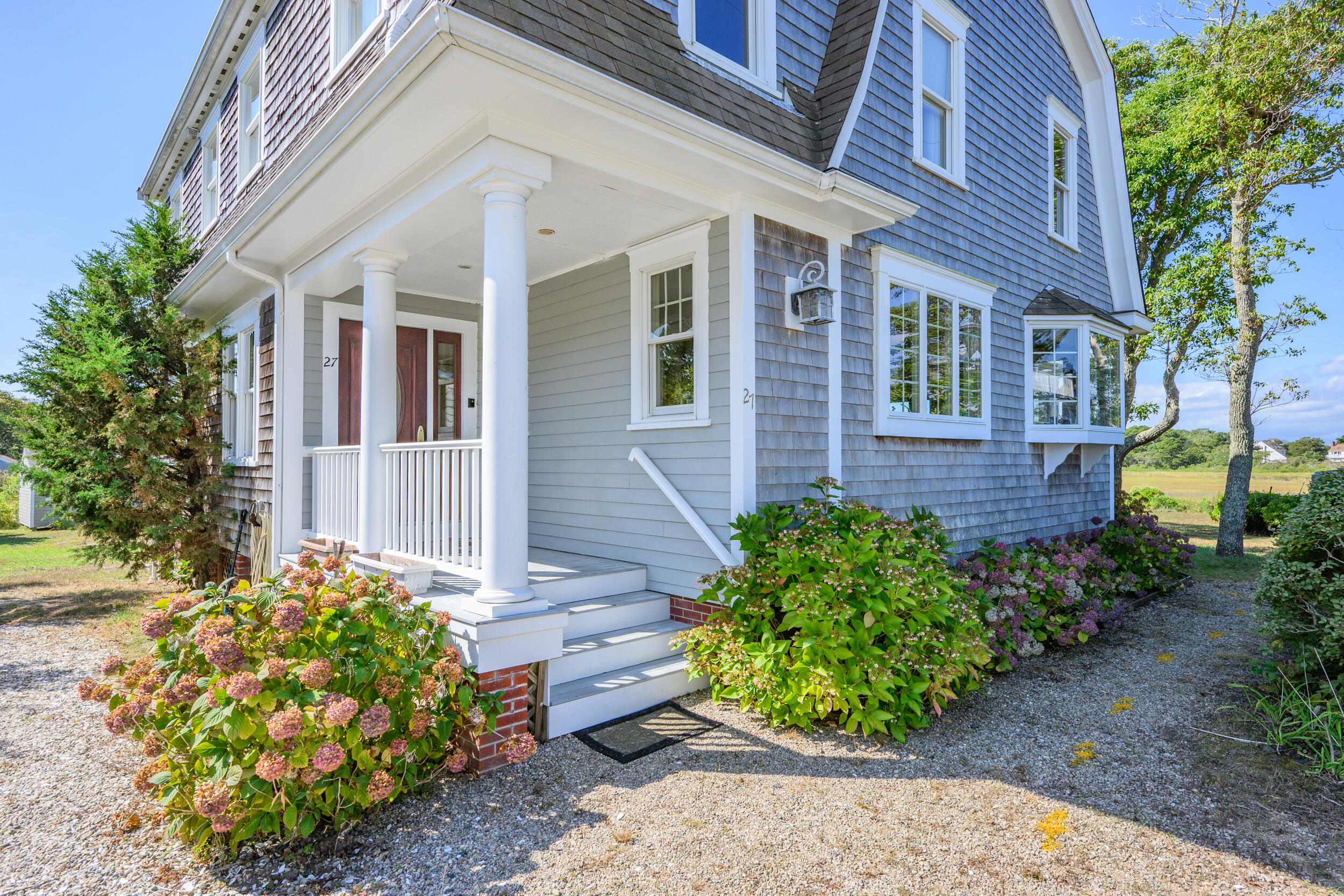 27 Mayflower Lane Dennis Port, MA 02639 - Photo 19 of 35 a view of a house with potted plants