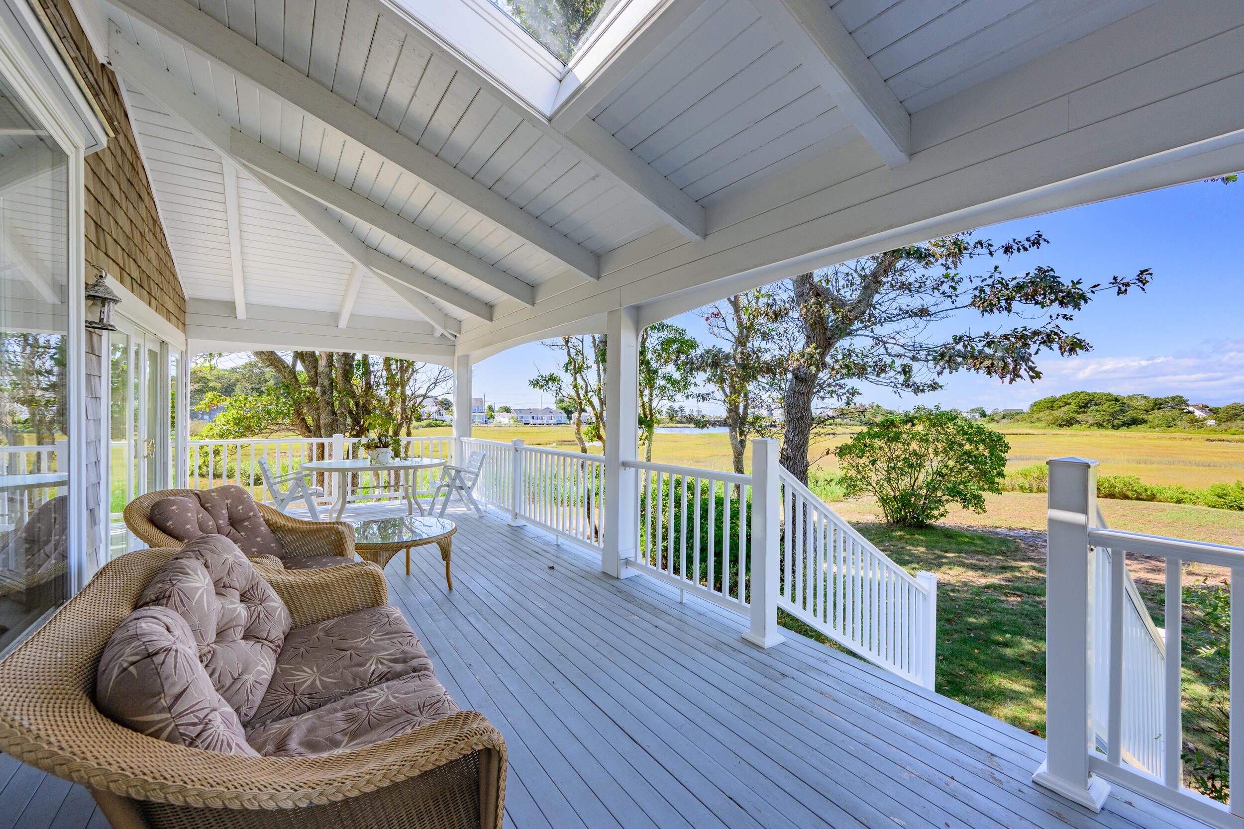 27 Mayflower Lane Dennis Port, MA 02639 - Photo 21 of 35 a living room with furniture and a large window