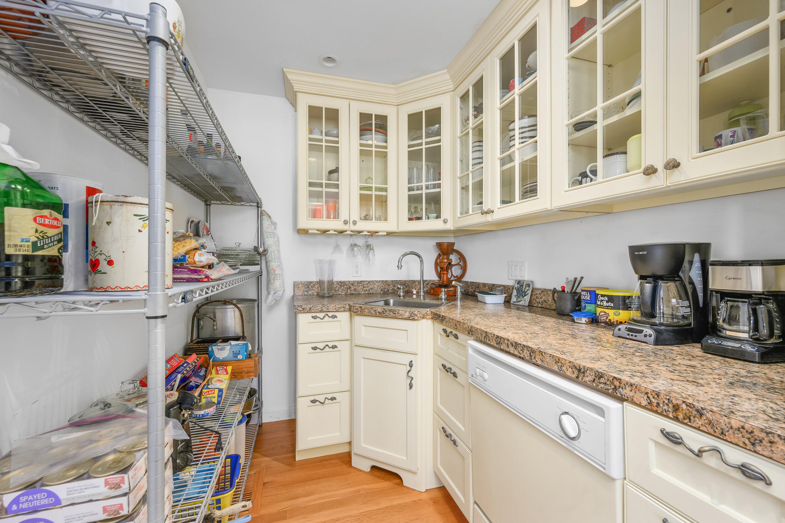 27 Mayflower Lane Dennis Port, MA 02639 - Photo 27 of 35 a kitchen with stainless steel appliances granite countertop a sink and cabinets