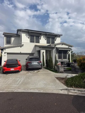 a car parked in front of a house
