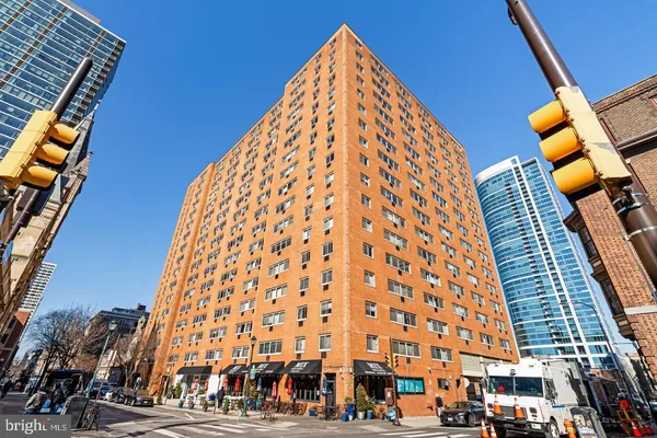 a view of a building with a street