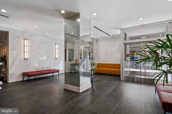 a lobby with furniture and a couch