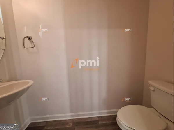 a view of an empty room with a garage