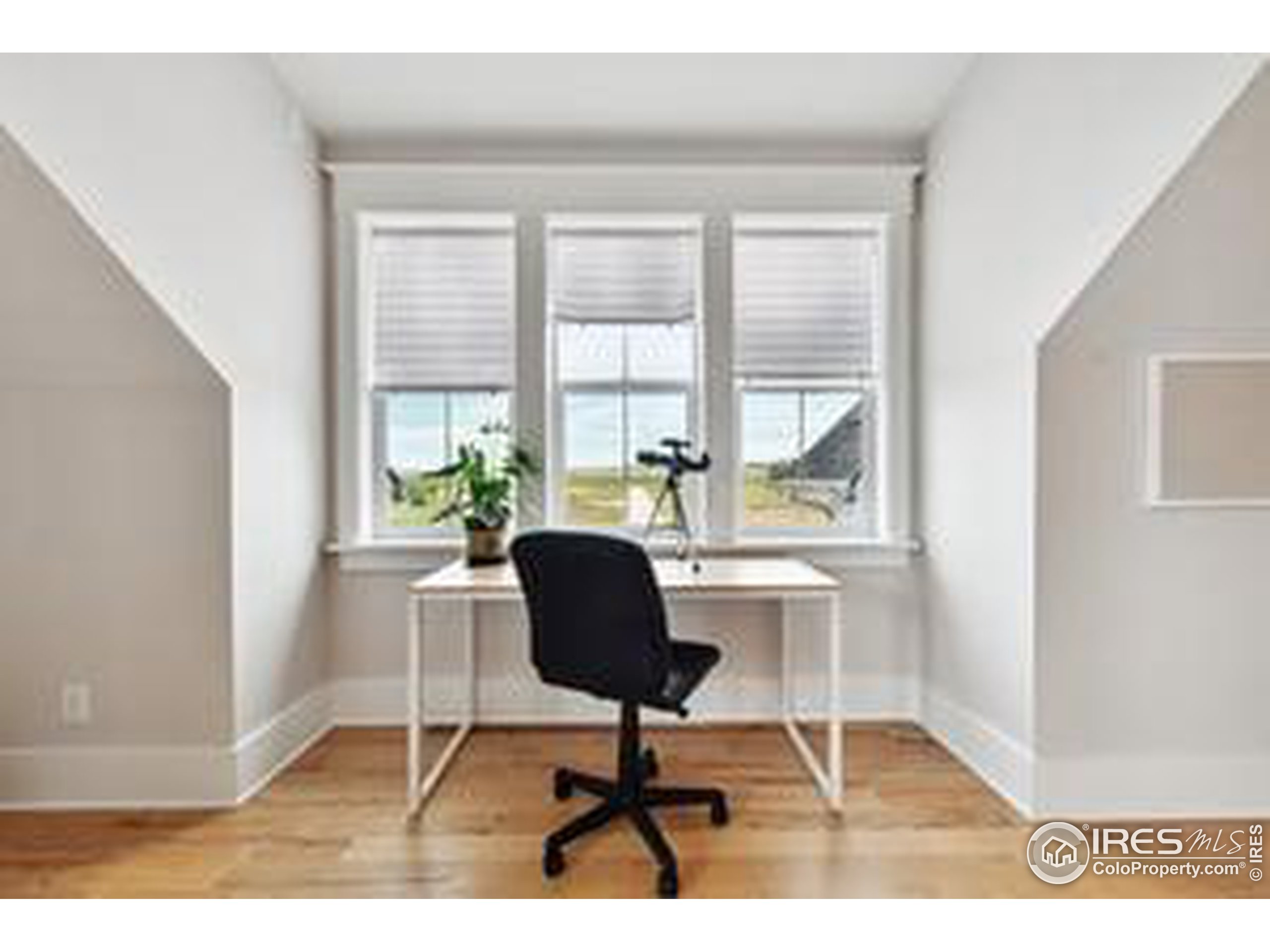 6261 County Road 41 Fort Lupton, CO 80621 - Photo 26 of 40 a living room with furniture and a window