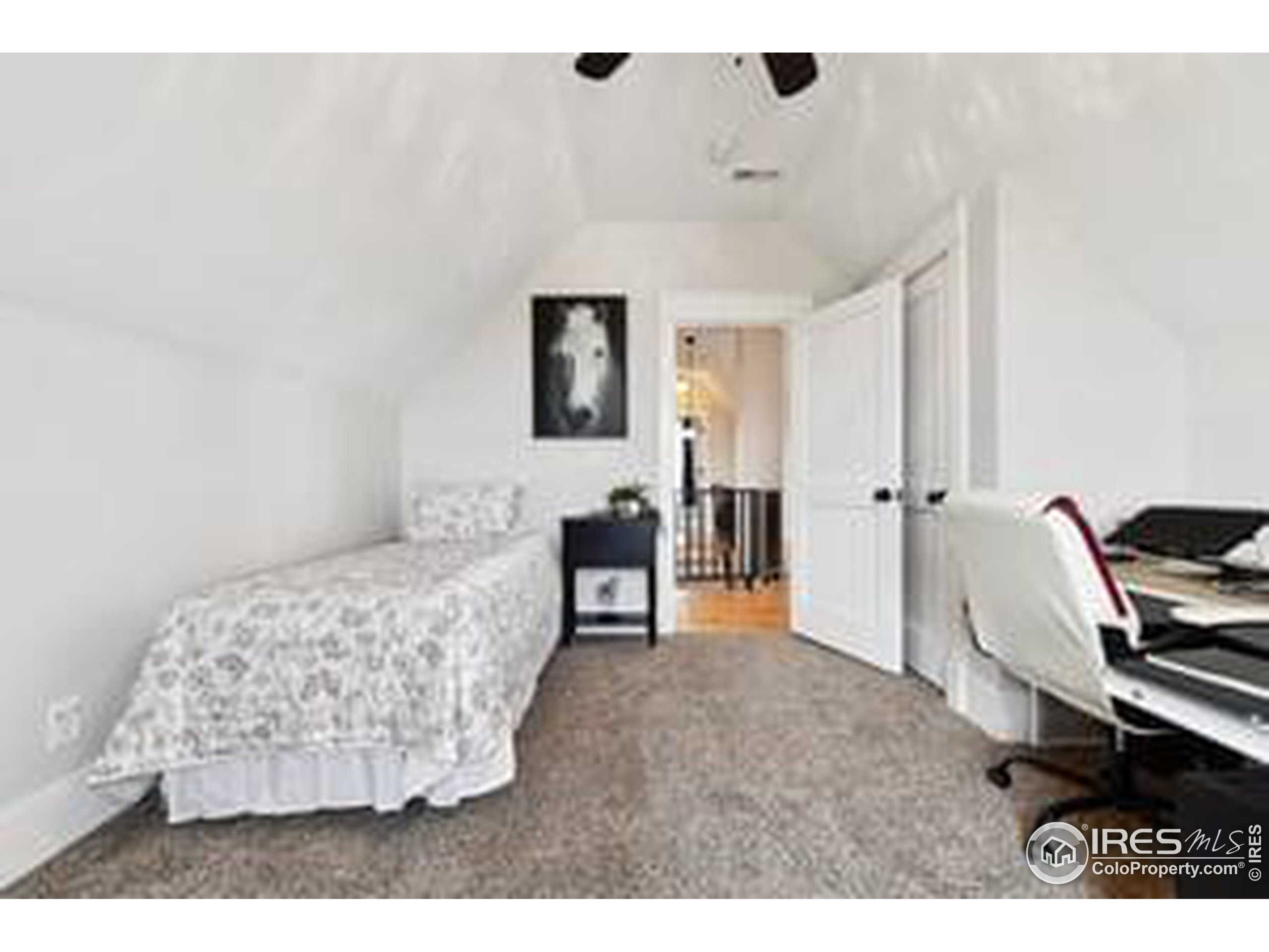 6261 County Road 41 Fort Lupton, CO 80621 - Photo 28 of 40 a bedroom with furniture and a window