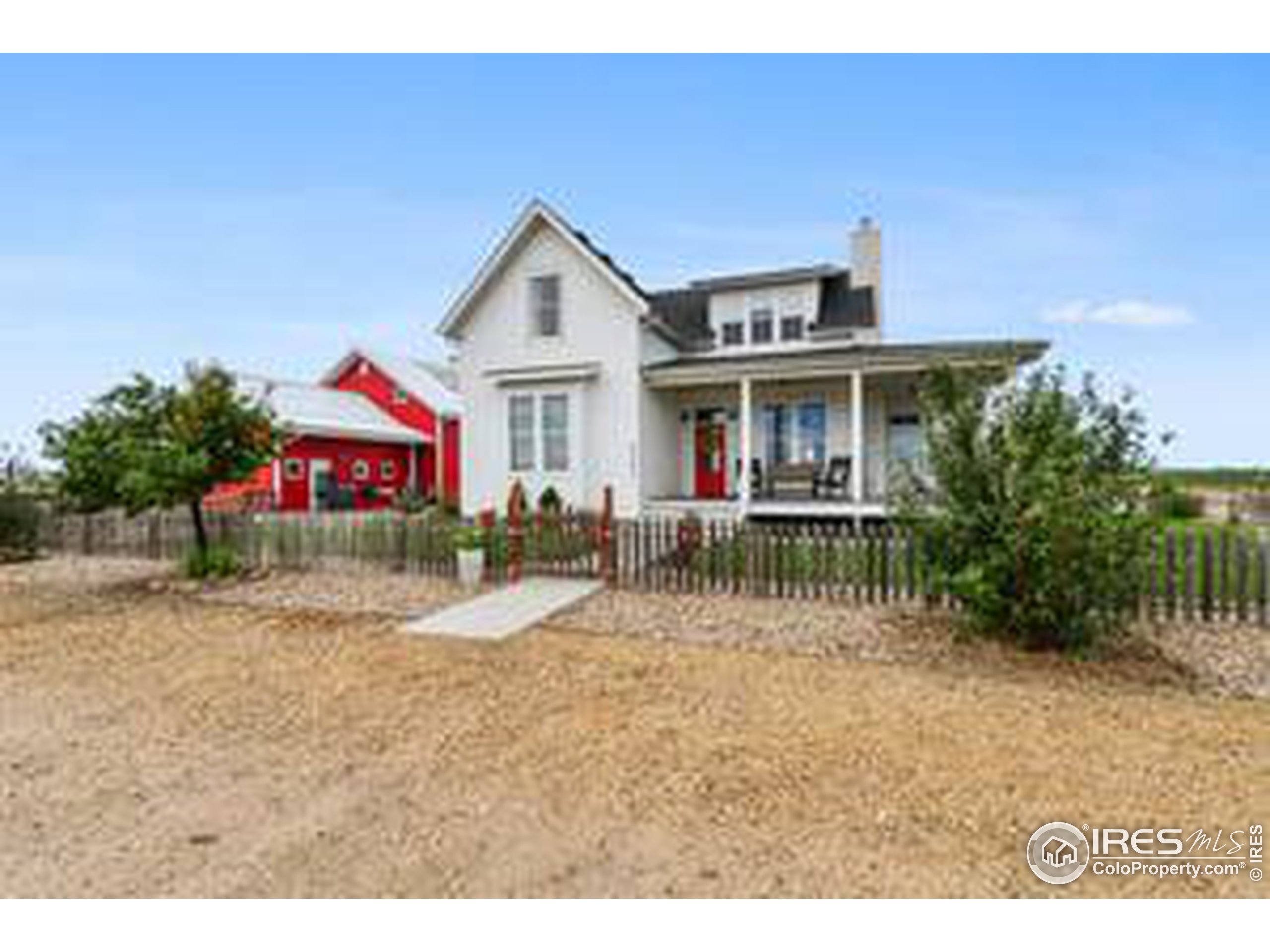 6261 County Road 41 Fort Lupton, CO 80621 - Photo 39 of 40 a front view of a house with a yard