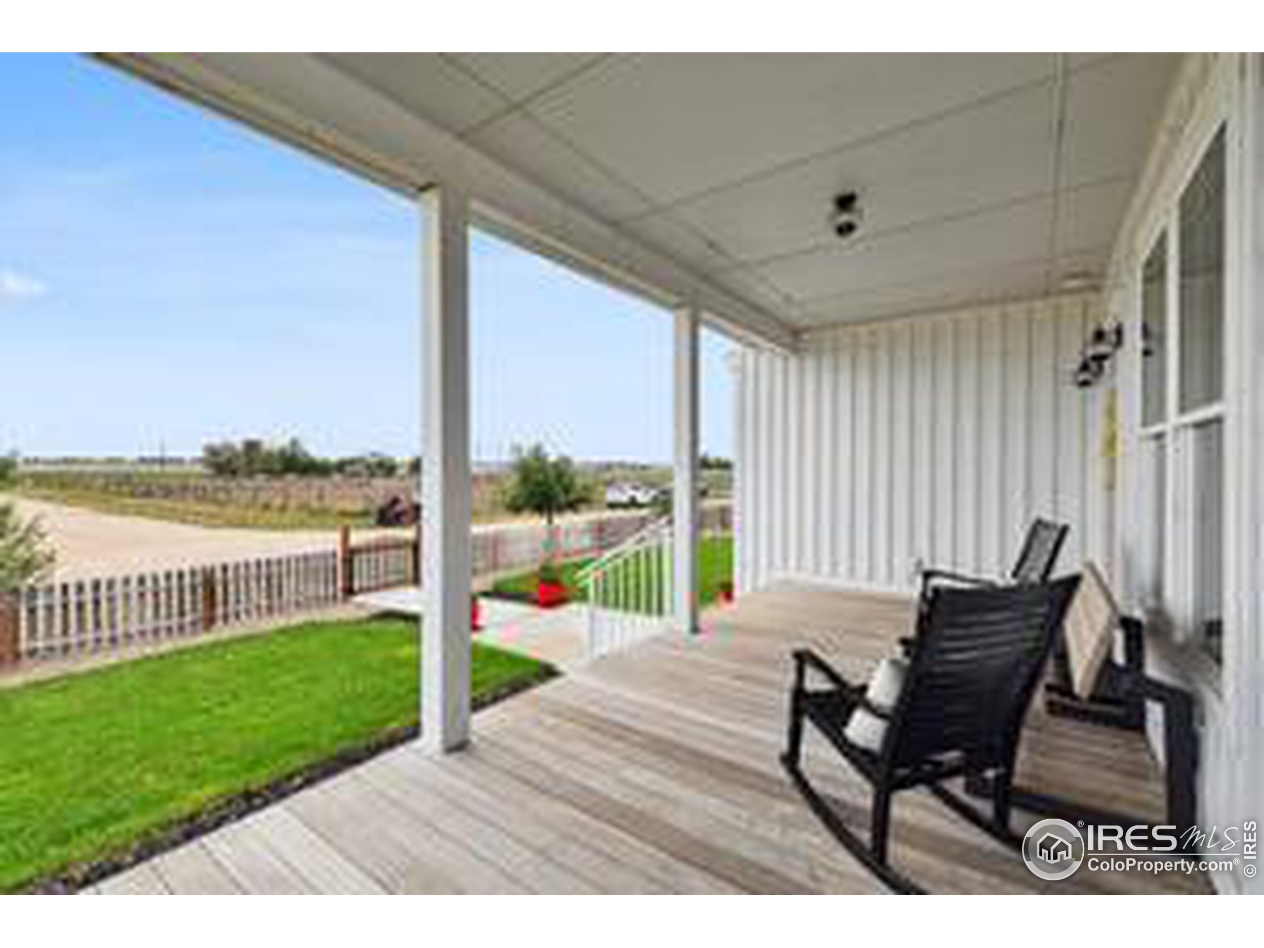 6261 County Road 41 Fort Lupton, CO 80621 - Photo 4 of 40 a view of a chairs and table in the garden