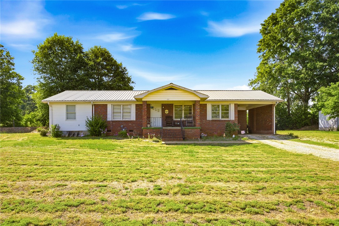282 West Bennett Road Westminster, SC 29693 - Photo 1 of 42 This charming residence features a classic brick exterior, offering comfortable living and a welcoming ambiance.
