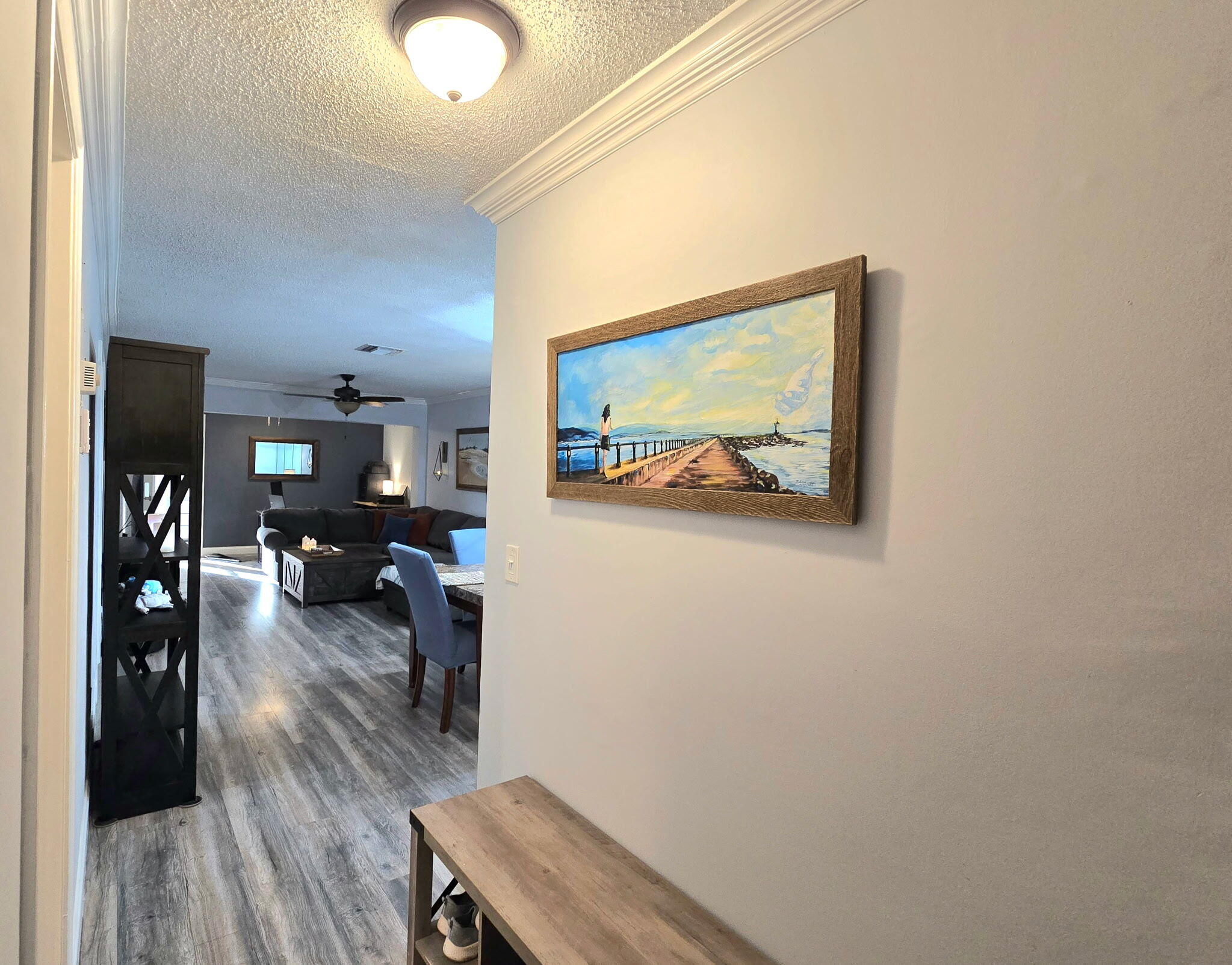 2720 Southwest 15th Street, Unit 2C Delray Beach, FL 33445 - Photo 31 of 31 a view of a livingroom with furniture and wooden floor