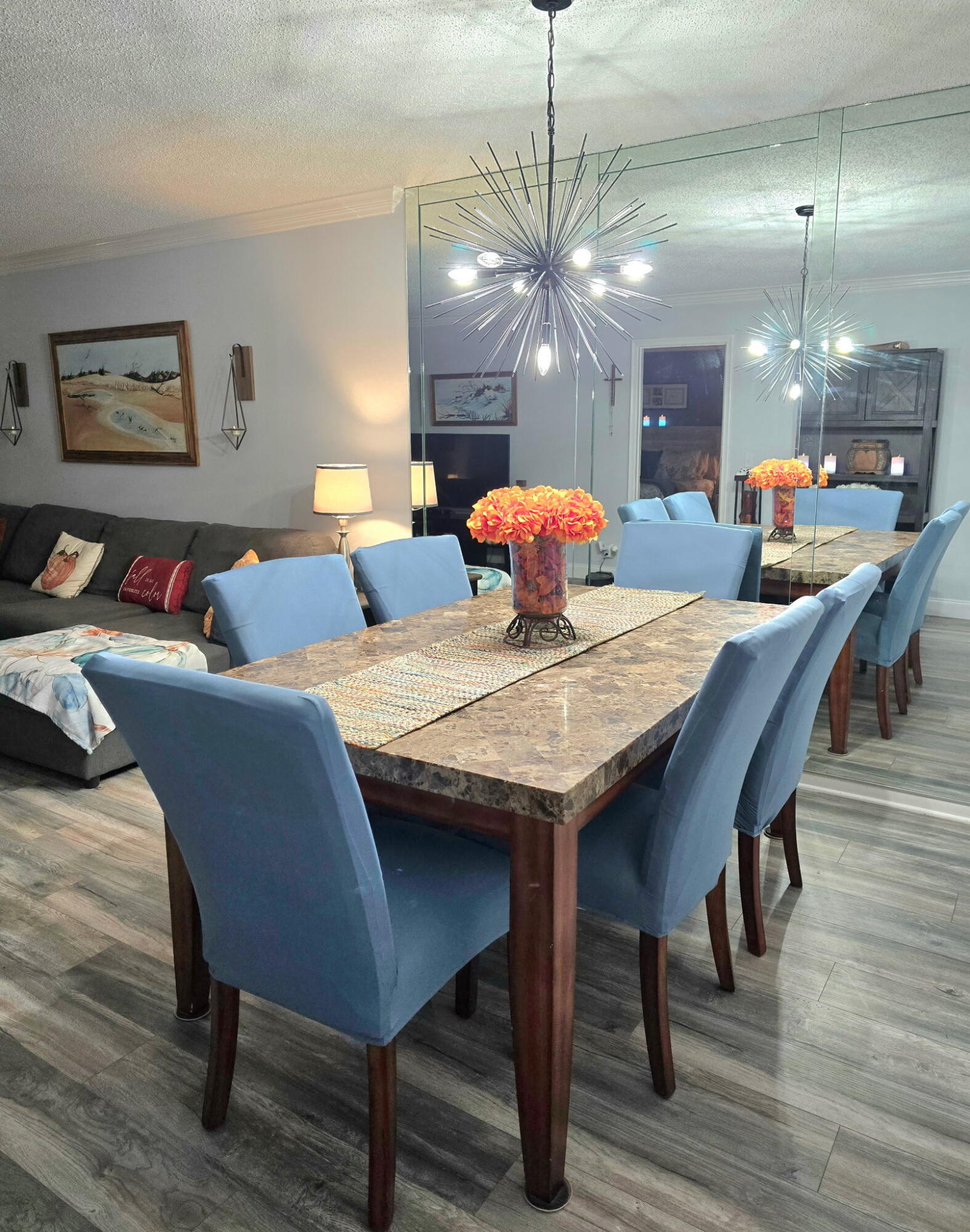 2720 Southwest 15th Street, Unit 2C Delray Beach, FL 33445 - Photo 9 of 31 a view of a dining room with furniture and wooden floor