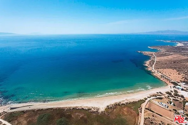 a view of a lake with a mountain in the background