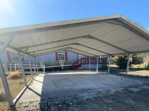 a view of a building with a patio