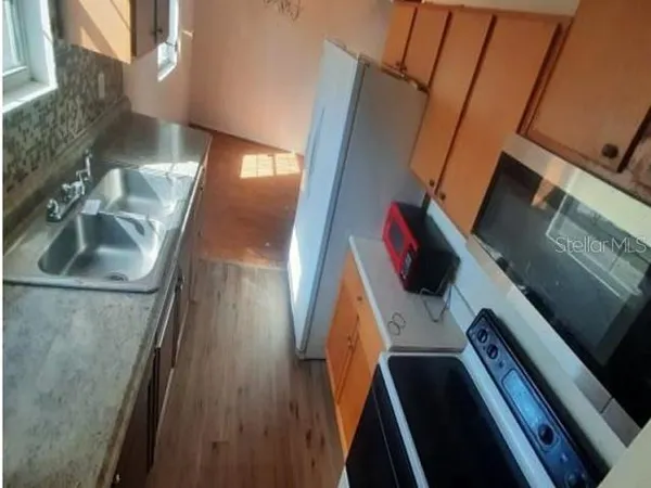 an empty room with windows