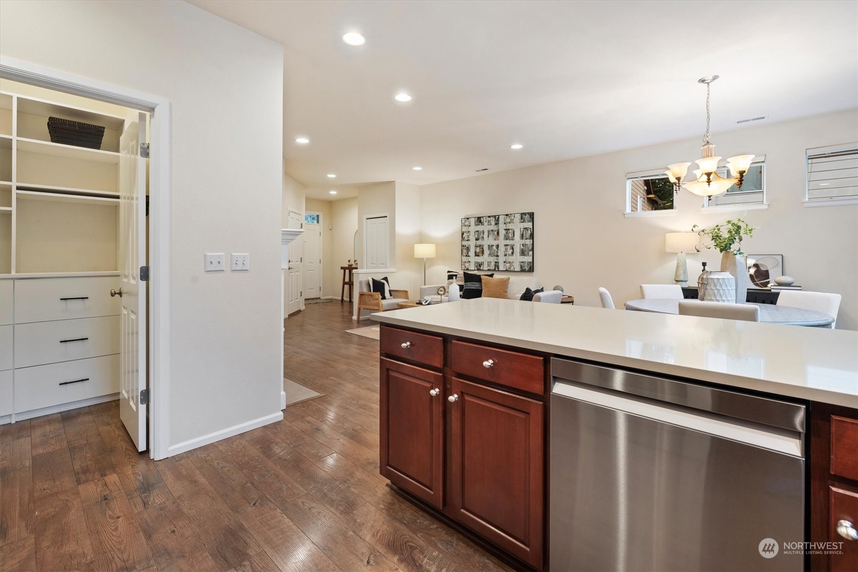 16023 35th Park Southeast Bothell, WA 98012 - Photo 11 of 34 a kitchen with kitchen island white cabinets and sink