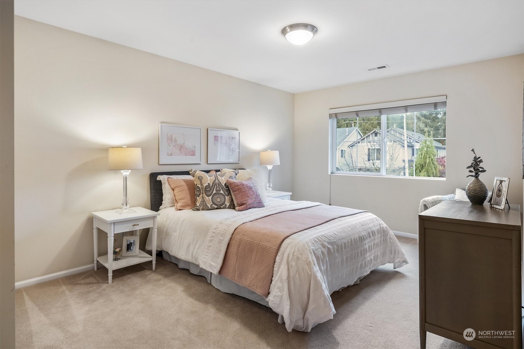 16023 35th Park Southeast Bothell, WA 98012 - Photo 23 of 34 a bedroom with a bed and windows