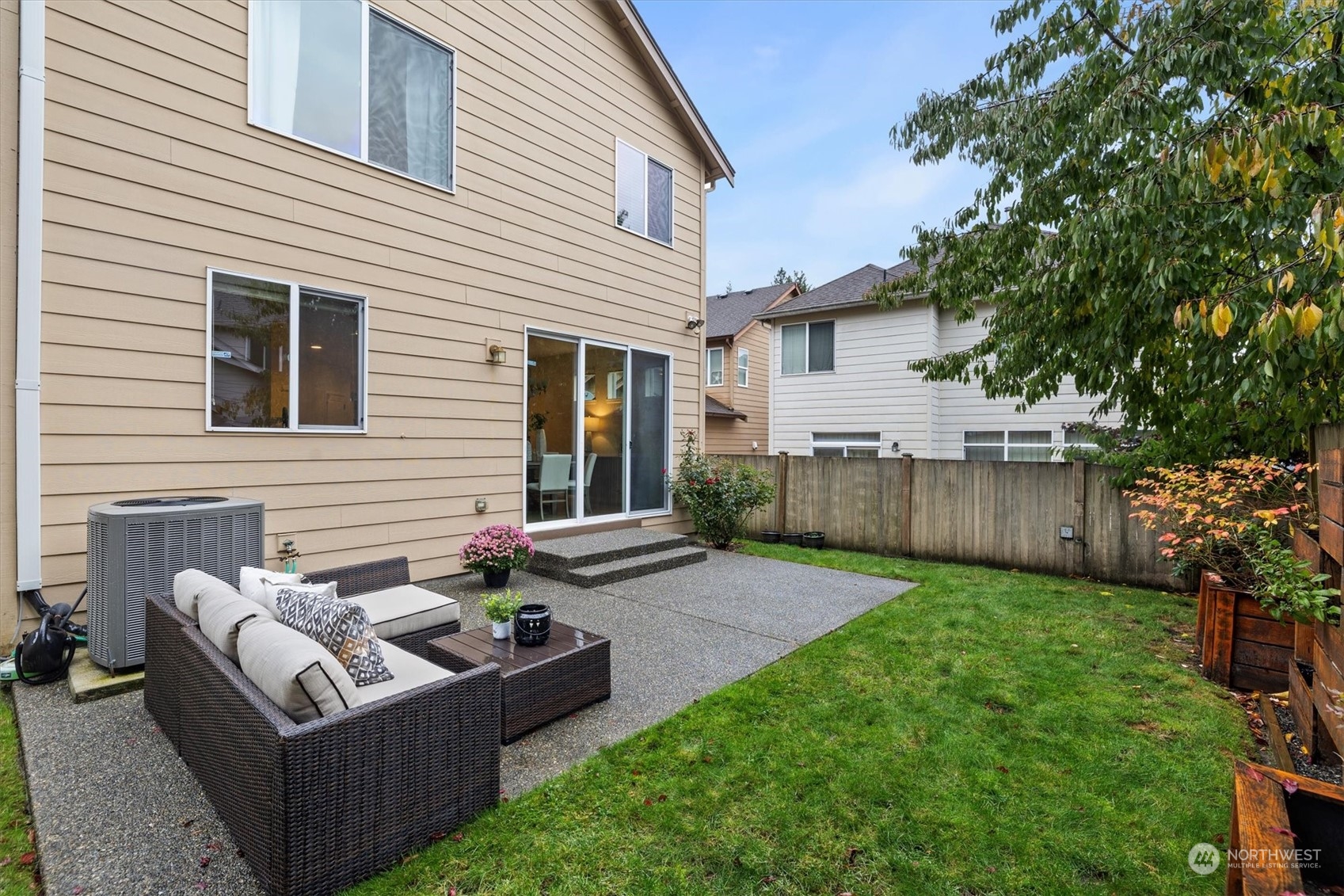 16023 35th Park Southeast Bothell, WA 98012 - Photo 25 of 34 a view of a house and a back yard with a patio