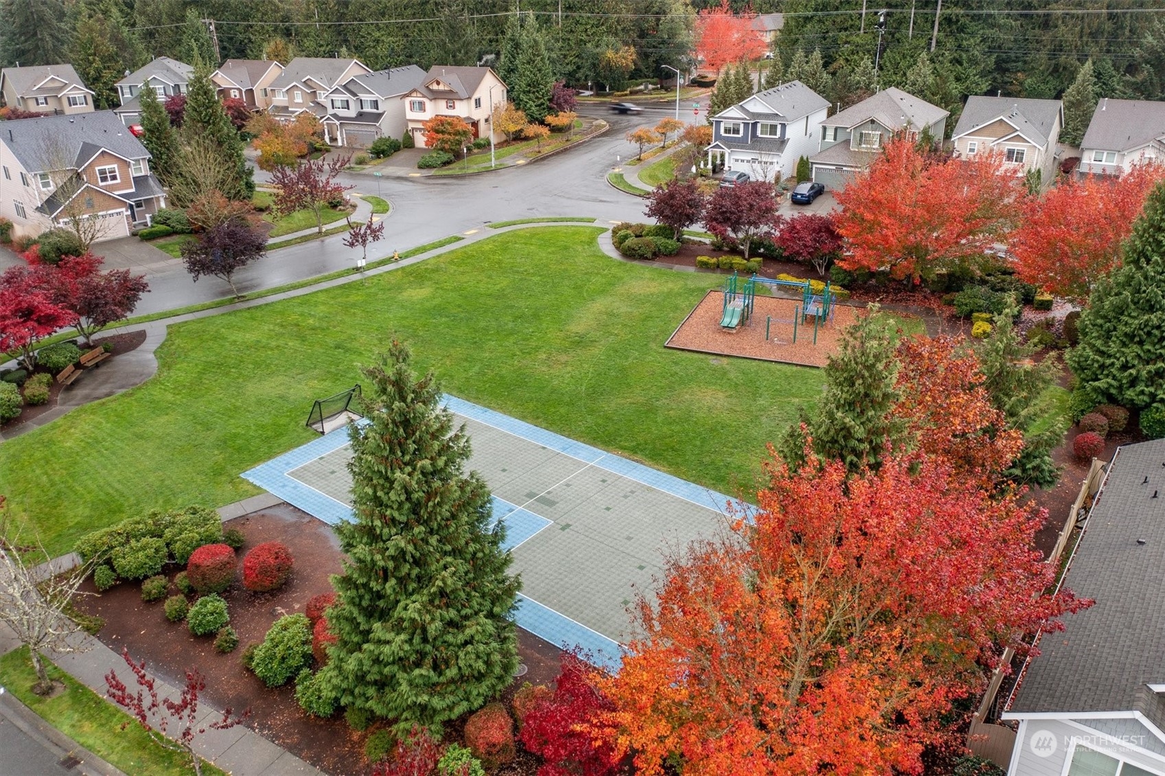 16023 35th Park Southeast Bothell, WA 98012 - Photo 31 of 34 an aerial view of a house with a garden and lake view