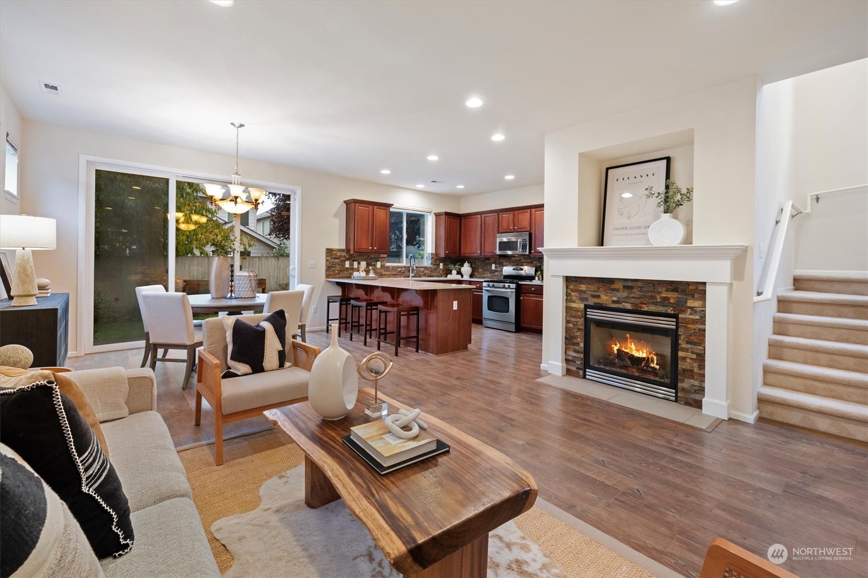 16023 35th Park Southeast Bothell, WA 98012 - Photo 4 of 34 a living room with furniture and a fireplace