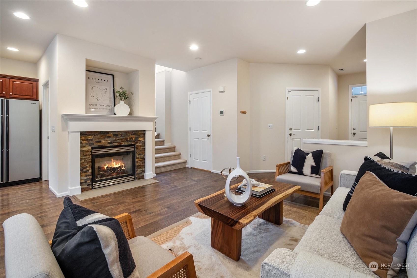16023 35th Park Southeast Bothell, WA 98012 - Photo 6 of 34 a living room with furniture and a fireplace