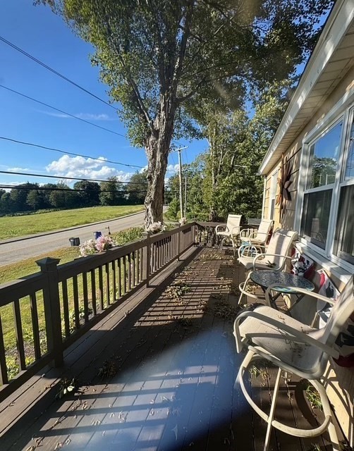 26 Glenwood Road, Unit 26 Rutland, MA 01543 - Photo 11 of 16 a view of a balcony with chairs